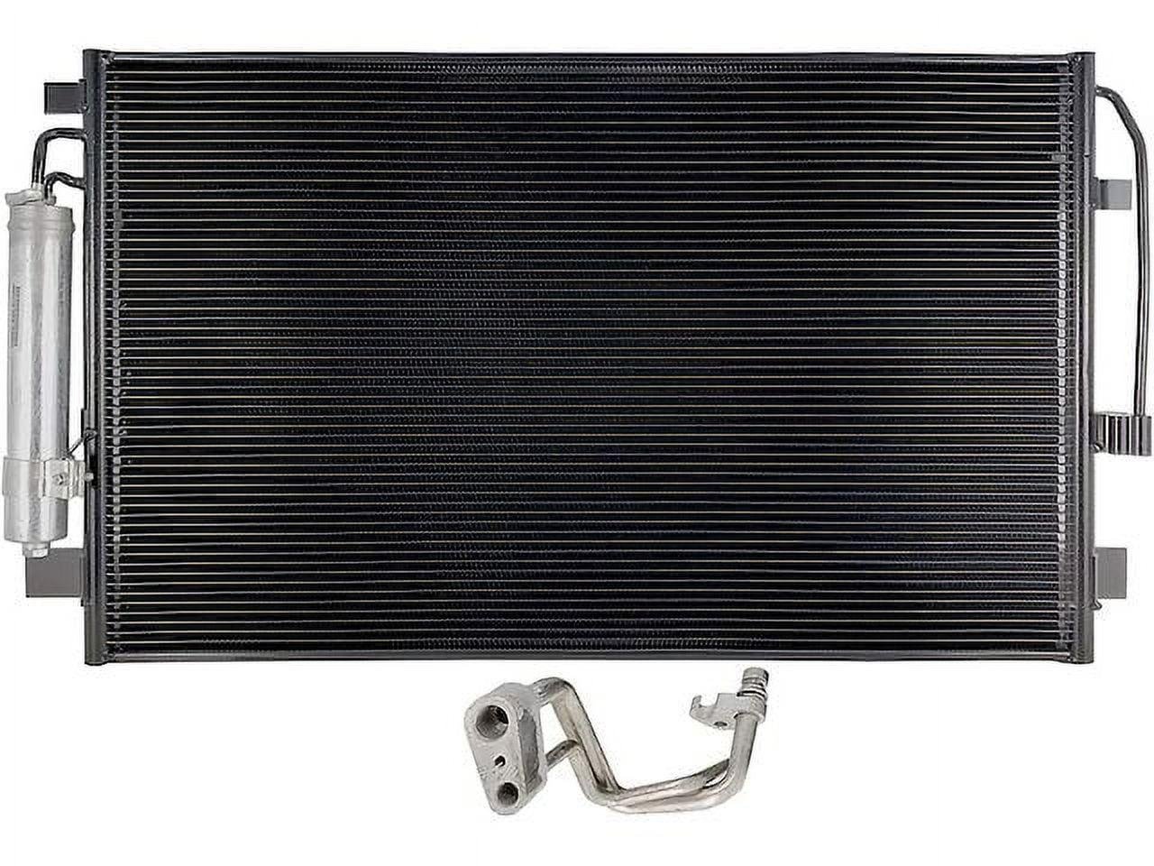 New AC condenser assembly with attached drier and integrated transmission oil cooler